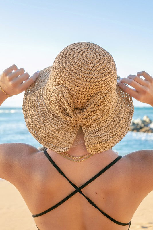 Bow Accent Woven Straw Bucket Sun Hat-Wild Willows Boutique NY– Massapequa, New York. Affordable and fashionable clothing for women of all ages. Bottoms, tops, dresses, intimates, outerwear, sweaters, shoes, accessories, jewelry, activewear and more//wild Willows Boutique