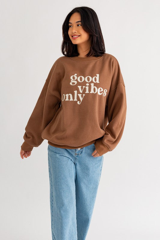 Good Vibes Sweatshirt -Wild Willows Boutique NY – Massapequa, New York. Affordable and fashionable clothing for women of all ages. Bottoms, tops, dresses, intimates, outerwear, sweaters, shoes, accessories, jewelry, activewear and more//wild Willow Boutique