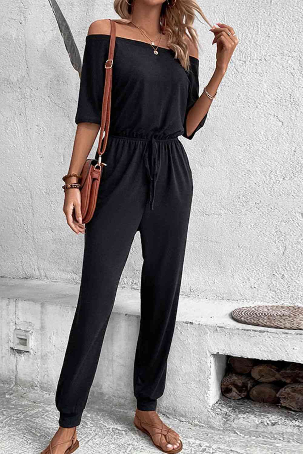 Off-Shoulder Jumpsuit with Pockets -  - Wild Willows Boutique - Massapequa, NY, affordable and fashionable clothing for women of all ages. Bottoms, tops, dresses, intimates, outerwear, sweater, shoes, accessories, jewelry, active wear, and more // Wild Willow Boutique.