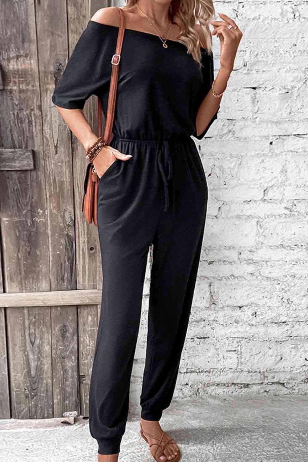 Off-Shoulder Jumpsuit with Pockets -  - Wild Willows Boutique - Massapequa, NY, affordable and fashionable clothing for women of all ages. Bottoms, tops, dresses, intimates, outerwear, sweater, shoes, accessories, jewelry, active wear, and more // Wild Willow Boutique.